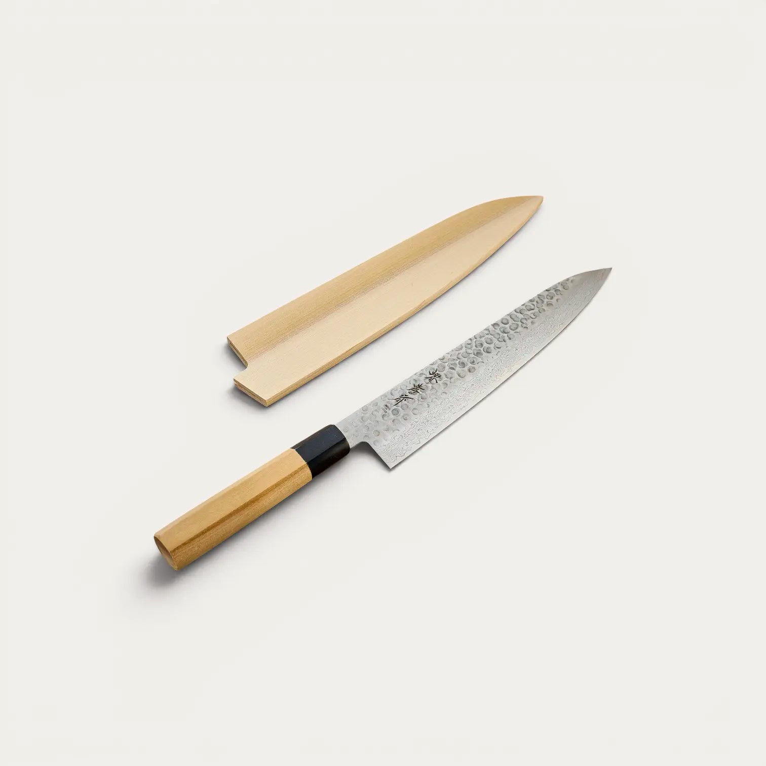 Faca Chef lâmina Damascena 45 camadas martelada 240 mm
