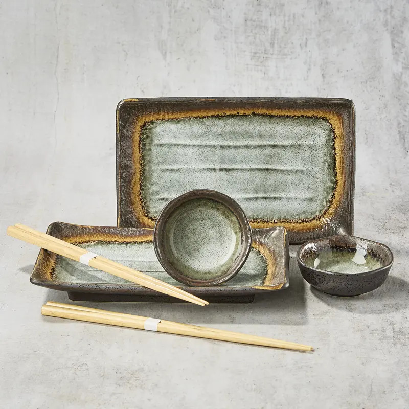 Duo rectangular sushi plates and sucking cups with assorted soy sauce Duo rectangular sushi plates and sucking cups with assorted soy sauce