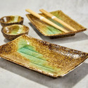 Duo rectangular sushi plates and sucking cups with assorted soy sauce Duo rectangular sushi plates and sucking cups with assorted soy sauce