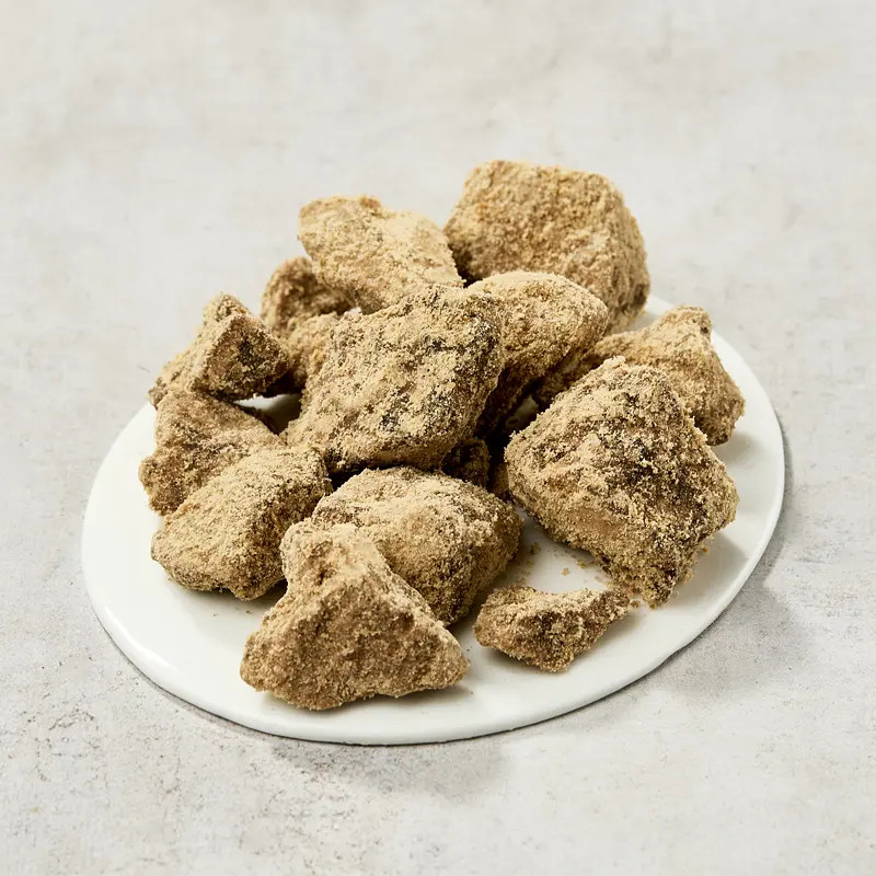 Kokuto, black raw cane sugar, pieces, hateruma Kokuto, black raw cane sugar, pieces, hateruma