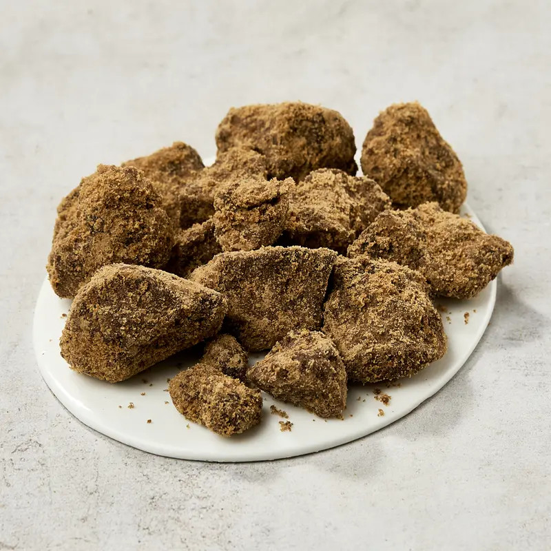 Kokuto, black raw cane sugar, pieces, yonaguni Kokuto, black raw cane sugar, pieces, yonaguni