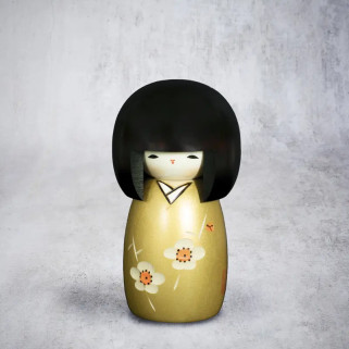 Kokeshi lutka u cvetu
