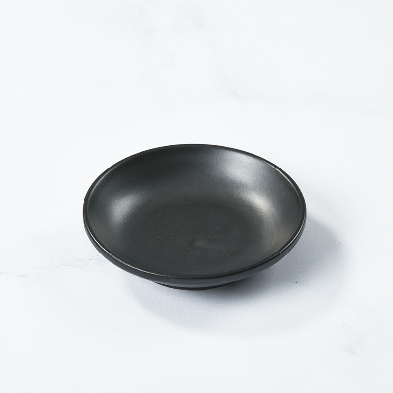 Black soy sauce or tsukemono dish