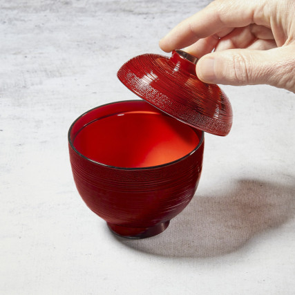 Traditional miso soup bowl with random lines and fabric pattern