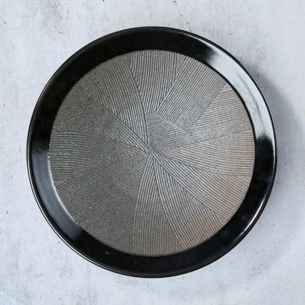 Kushime membachi tallrikar 