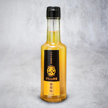 Tillstånd med ris ättika och mandarin juice mikan