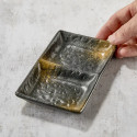 Soy sauce and condiment dish