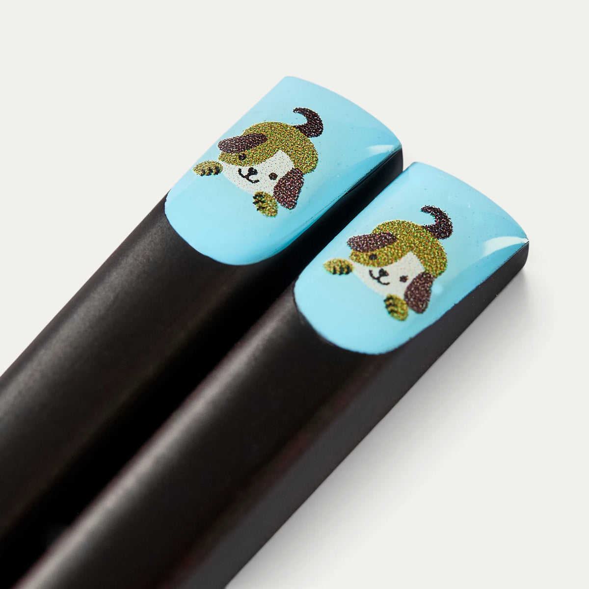 Paar Essstäbchen Tierkreiszeichen